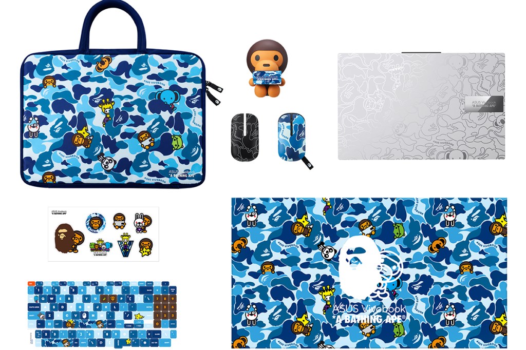 Das BAPE-Bundle mit silbernem ASUS Vivobook, blauer Tasche, Maus und weiteren Items vor weißem Hintergrund.