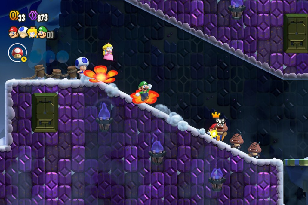 Screenshot aus dem Spiel Super Mario Bros. Wonder. Man sieht den Mehrspieler-Modus, wo vier Charaktere durch ein unterirdisches Level laufen.